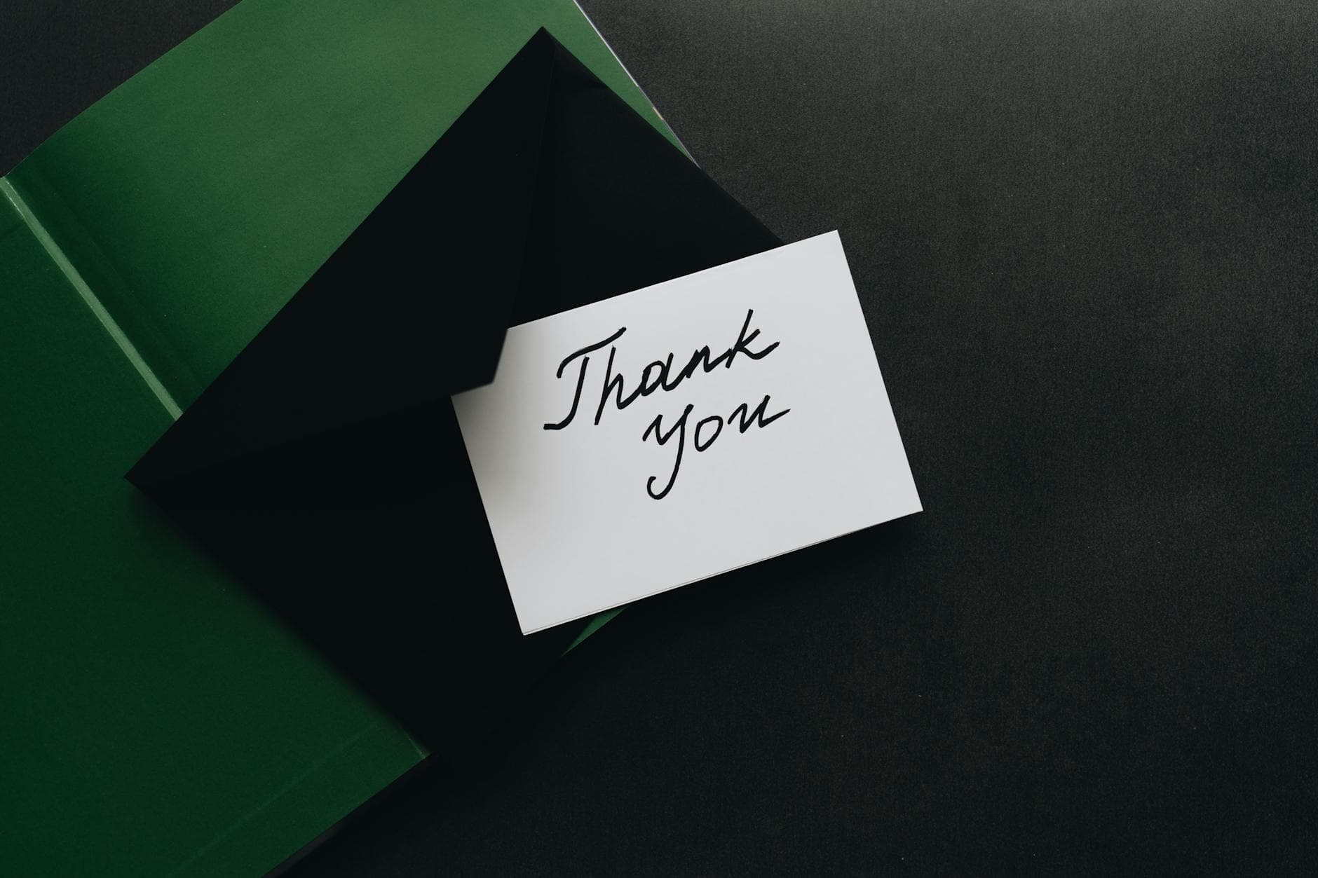 Minimalist thank you card with green envelope, perfect for expressing gratitude. - express gratitude relationships