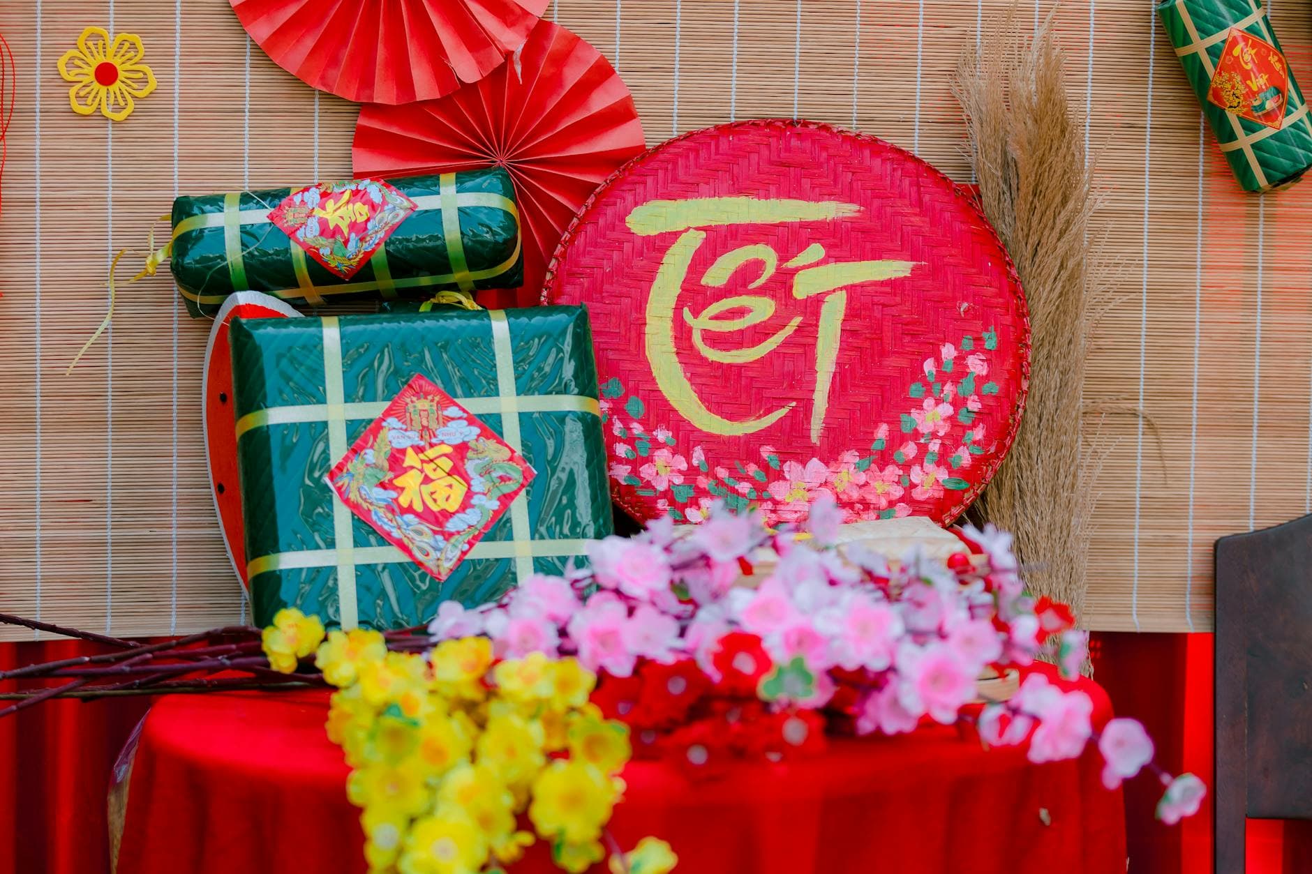 Colorful Tet festival decorations featuring traditional Vietnamese elements and floral arrangements. - rekindle intimacy couples