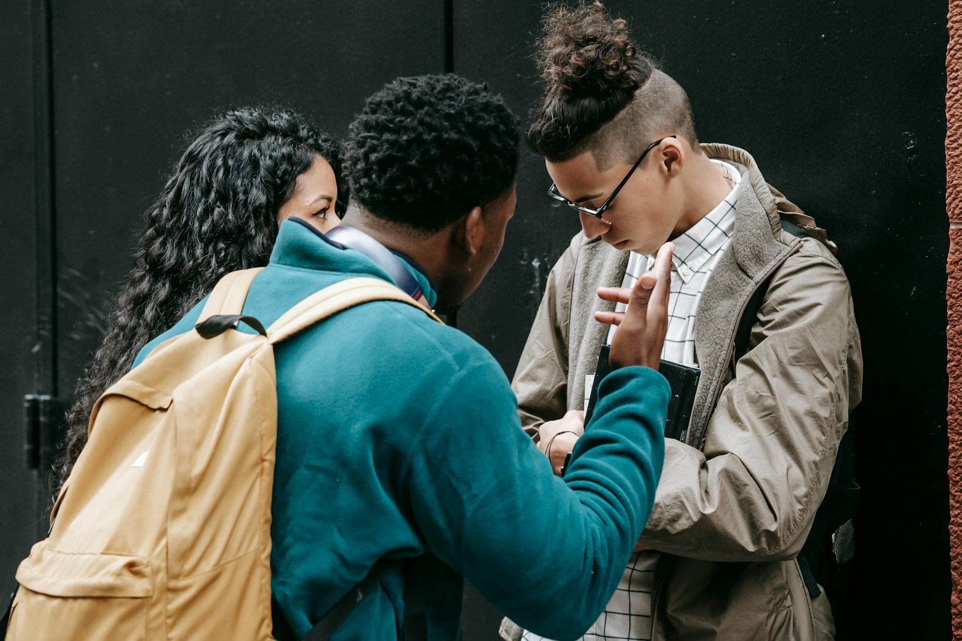 Group of diverse young adults passionately discussing on the street, displaying mixed emotions and active body language. - express needs conflict