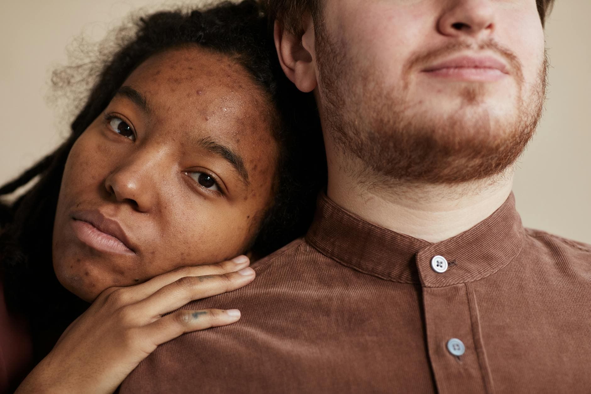 Close-up portrait of an interracial couple showcasing love and connection. - partner depression symptoms