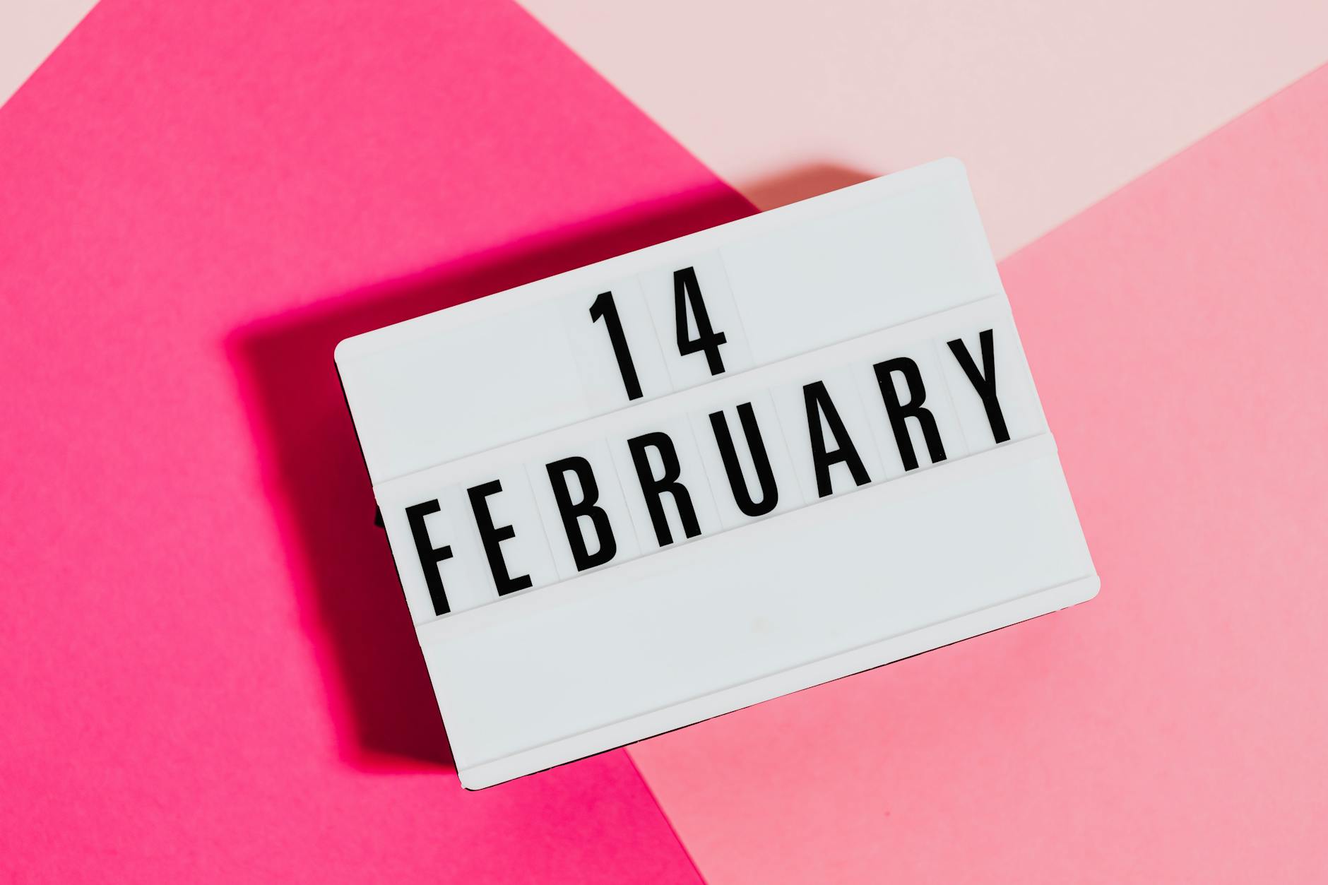 Stylish Valentine's Day message on February 14 with pink background. - at home date ideas february