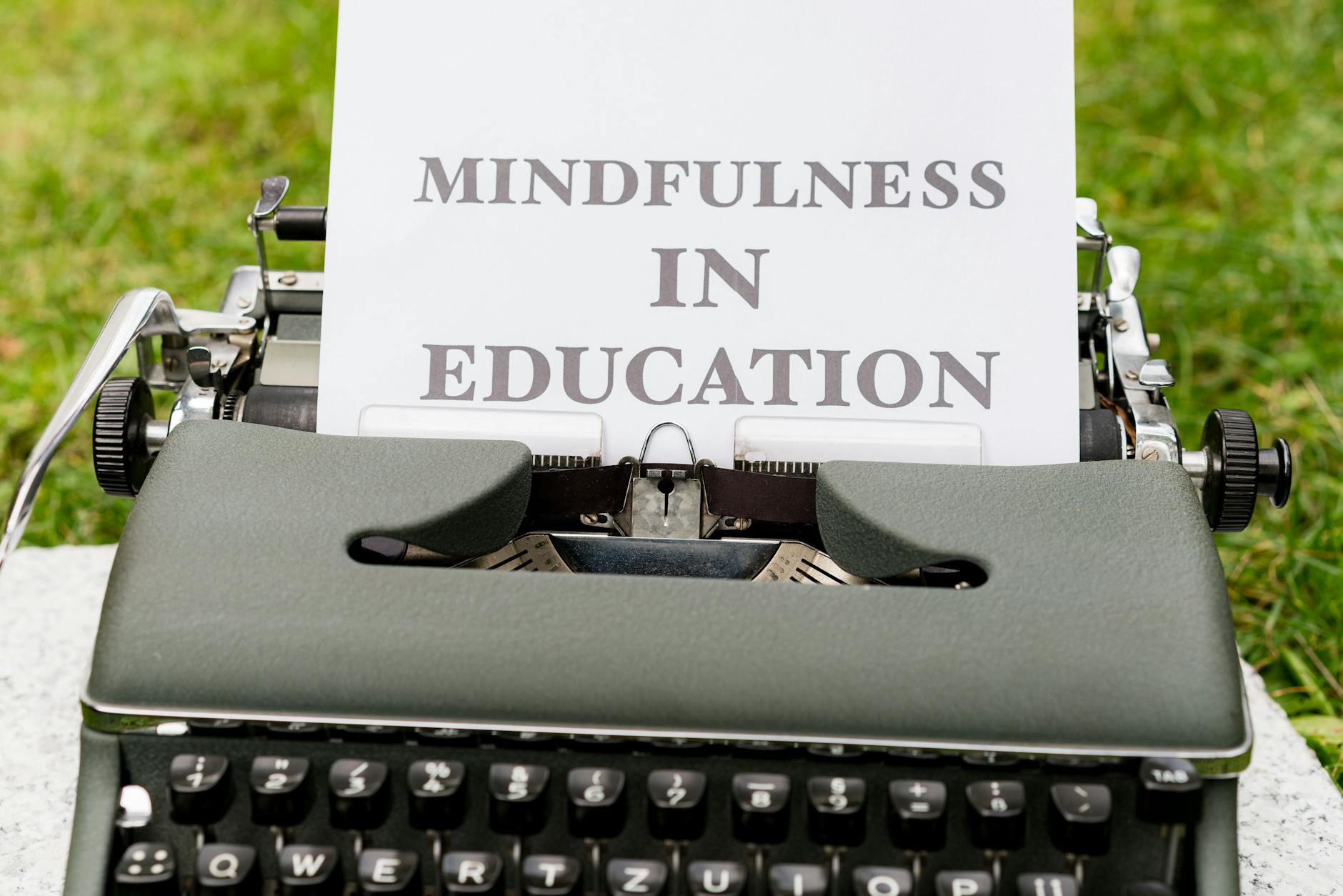A vintage typewriter showcasing 'Mindfulness in Education' concept outdoors. - mindfulness for winter blues
