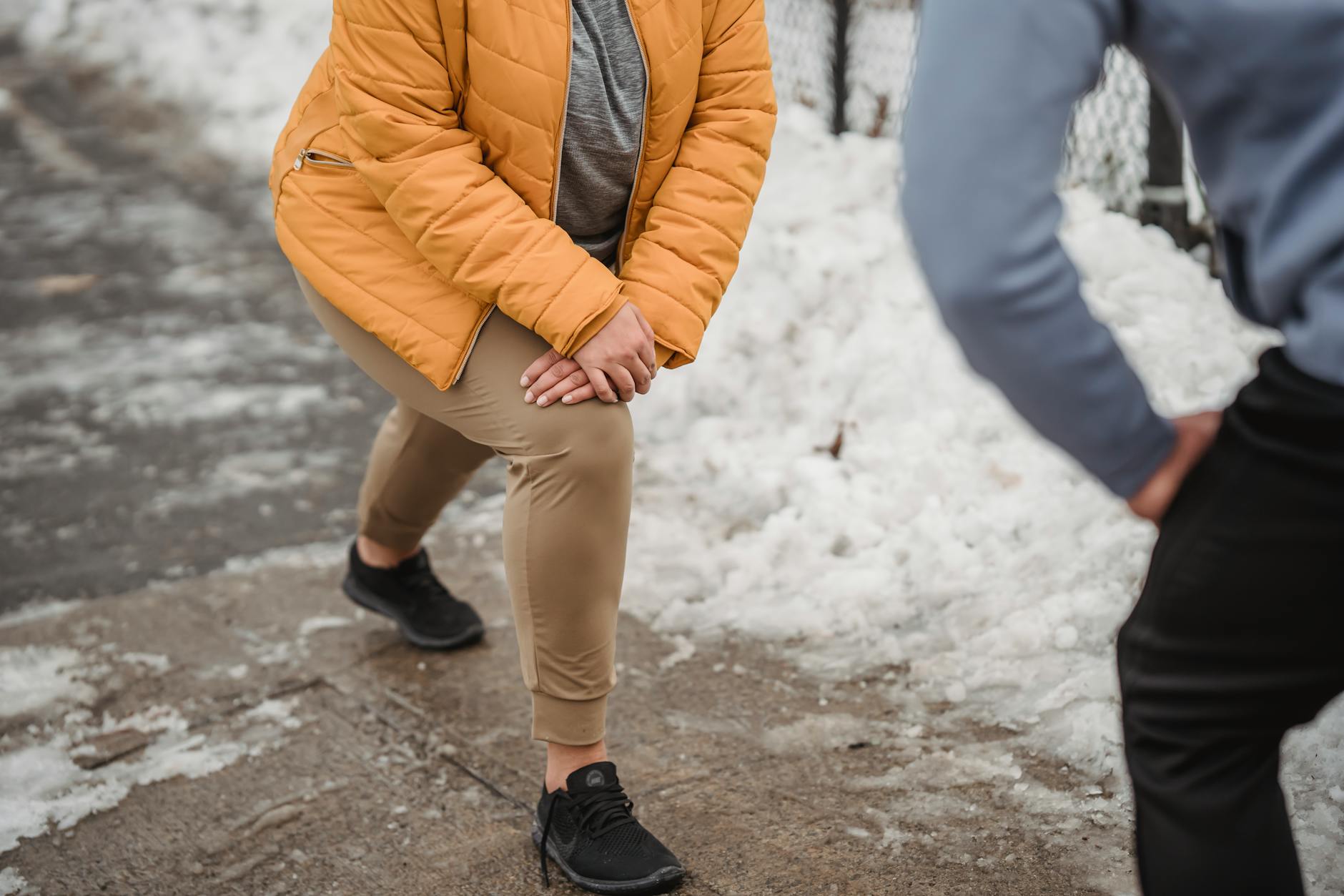 Plus-size individuals exercising outdoors in winter, building fitness and endurance. - winter mood boost activities