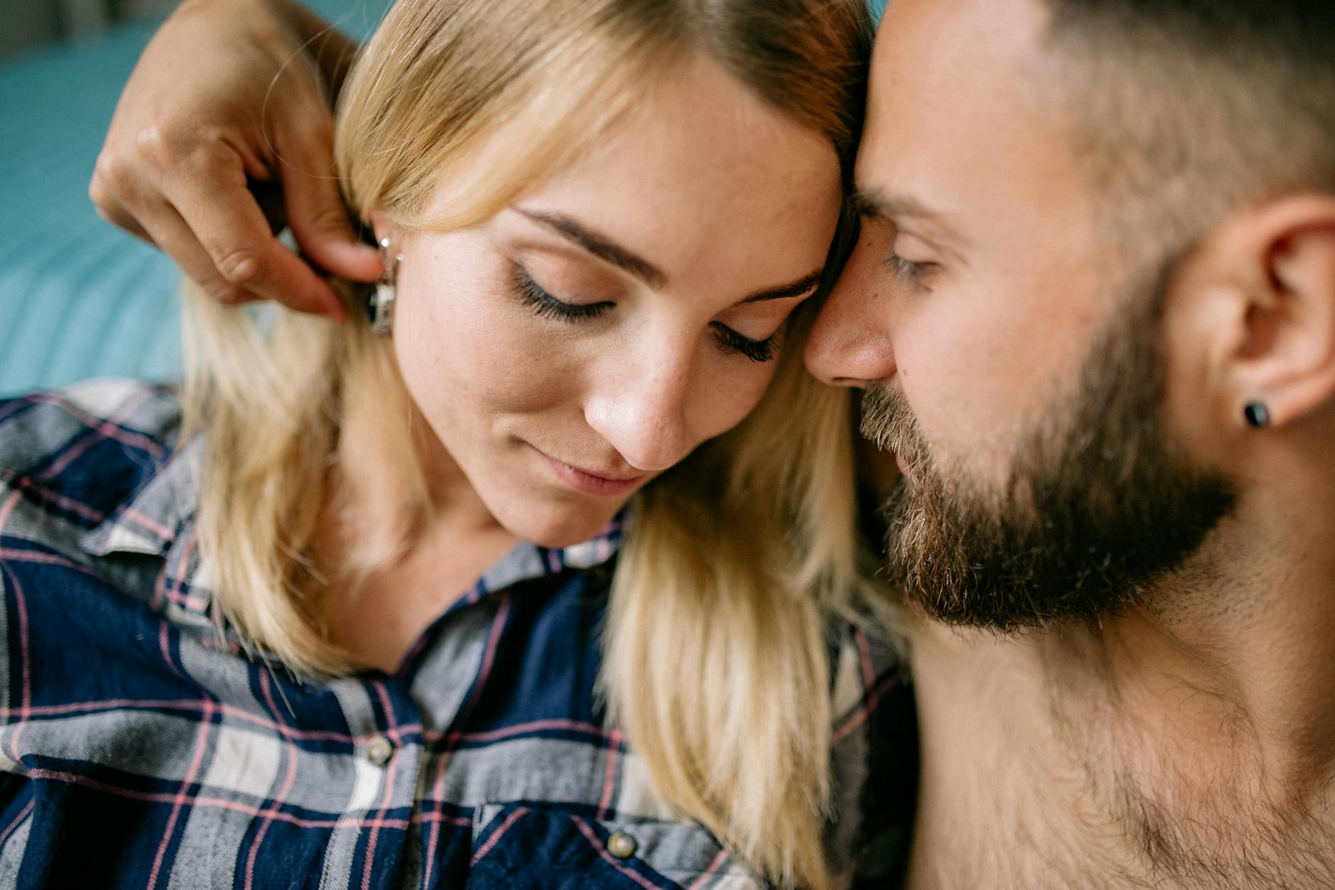 Close-up of a loving couple embracing with warmth and affection. Perfect for depicting romance. - winter proximity attachment styles