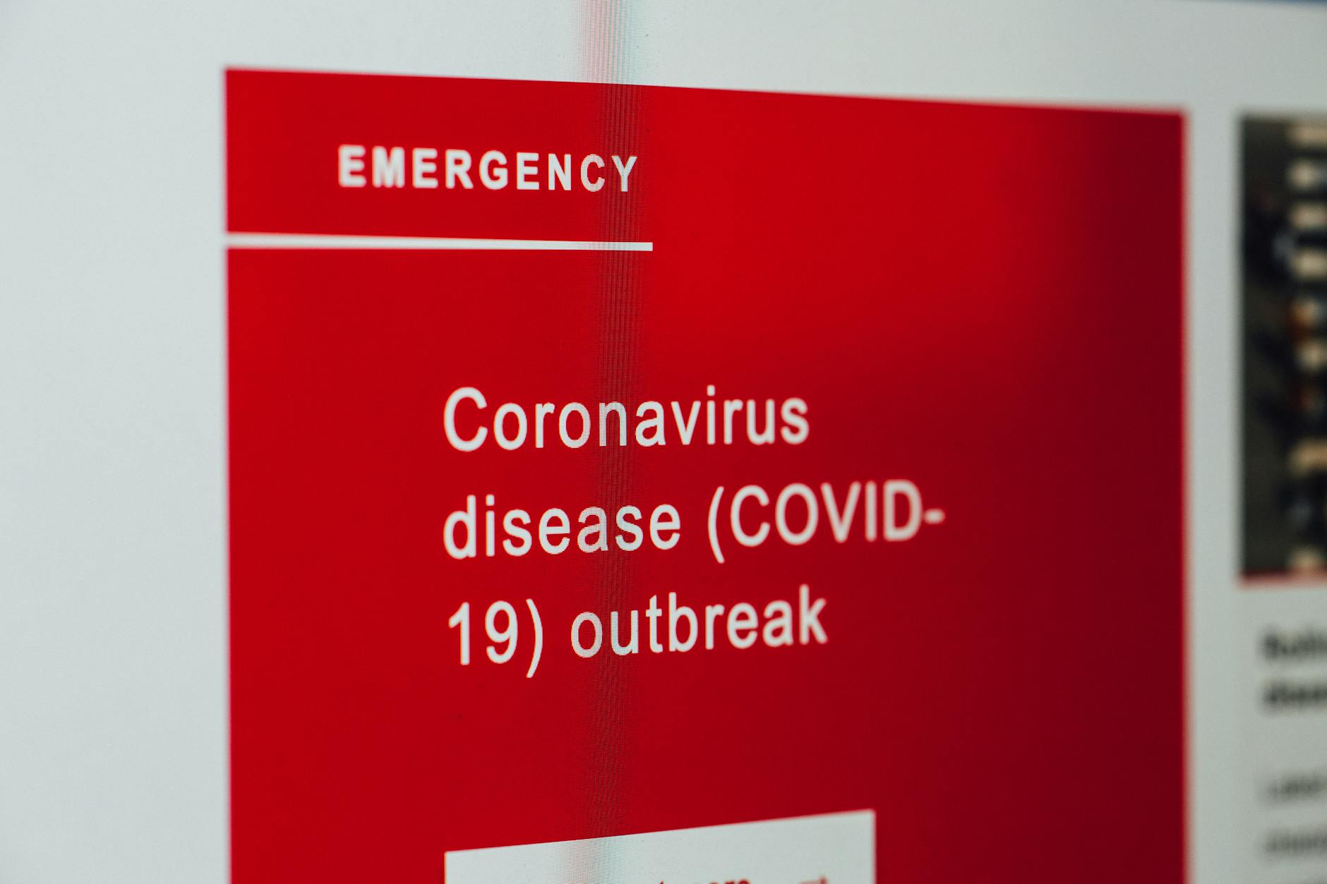 Close-up of a COVID-19 emergency alert message on a digital screen. - first message online dating