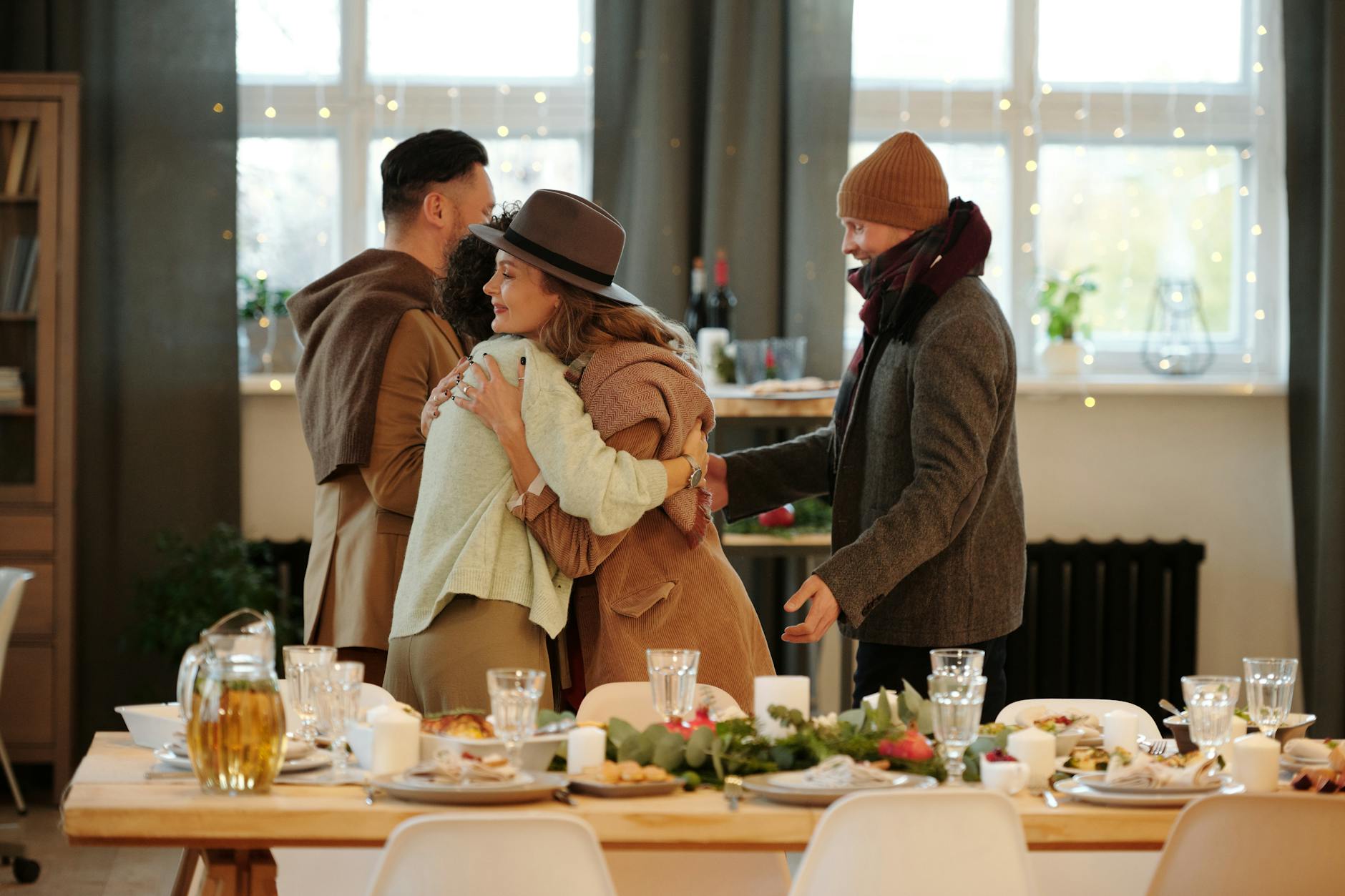 Family embracing and dining together indoors during festive holiday season. - post holiday family talk