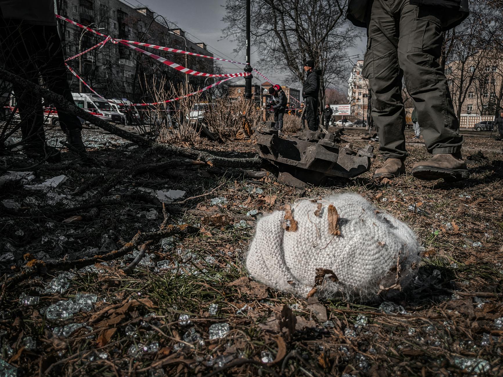 A chaotic urban scene depicting destruction with a knitted hat lying on the ground in Kyiv, Ukraine. - rebuild trust infidelity