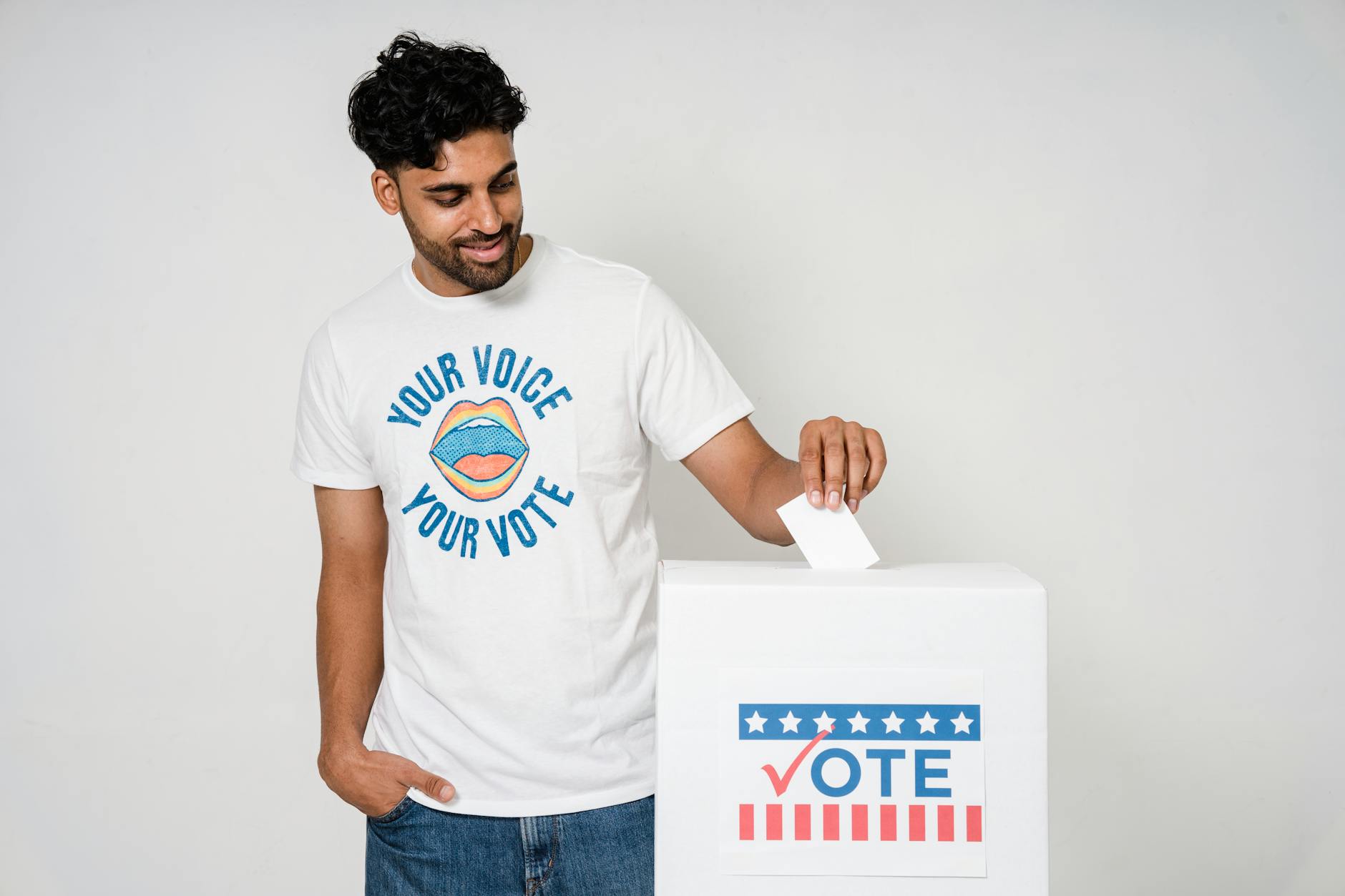 Man casting a vote in an election with a voting ballot box, promoting democratic participation. - refresh your relationship