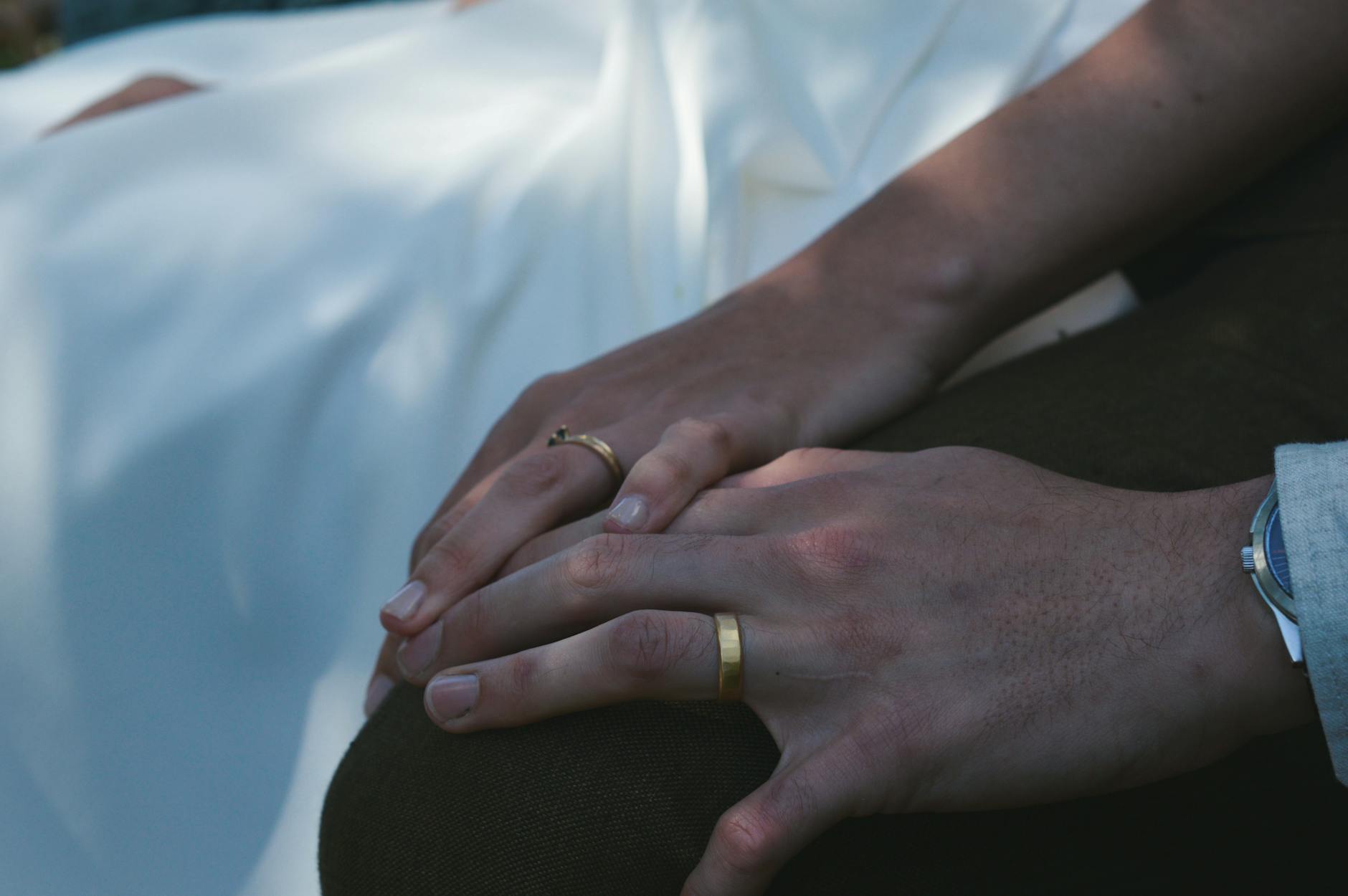 A close up of a man and woman's hands - rekindle marriage intimacy