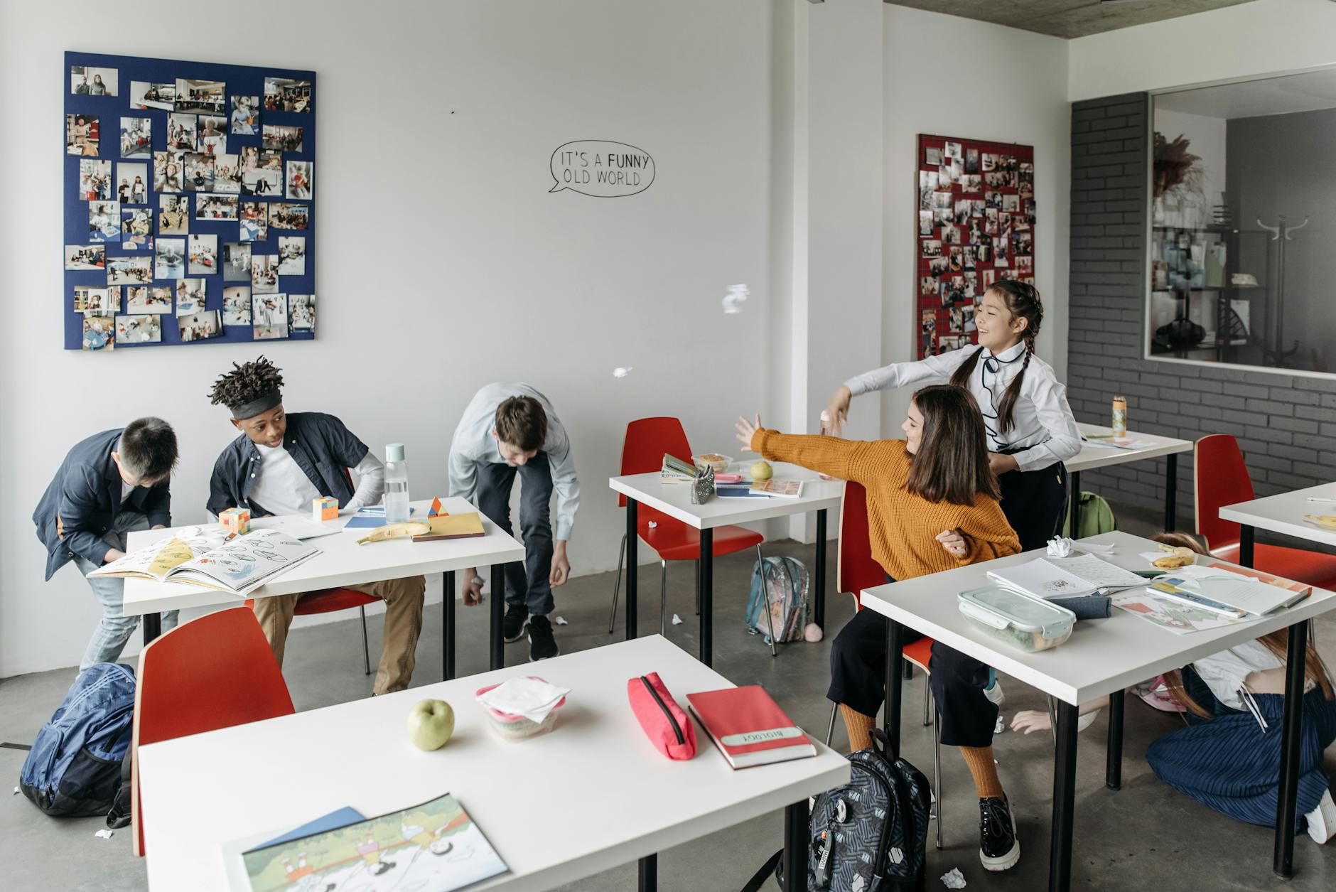 Students enjoying break time in a lively classroom setting. - school break transition