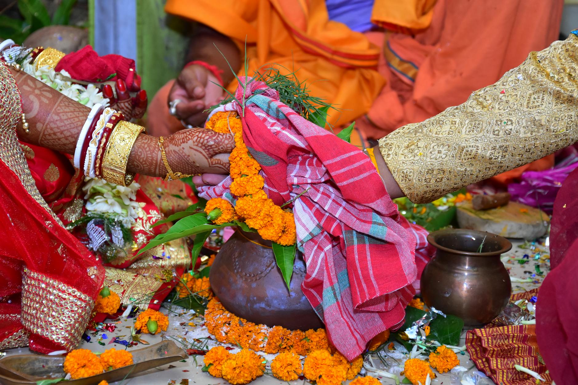 Colorful Indian wedding ceremony with intricate rituals and vibrant floral decorations. - marriage connection rituals