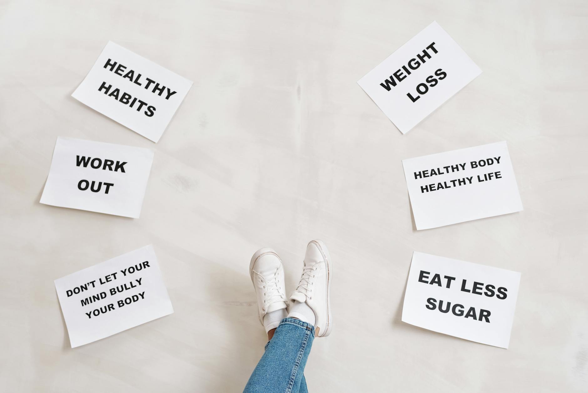 Inspirational health and fitness messages with shoe-clad feet, promoting healthy habits and wellbeing. - mental health habits