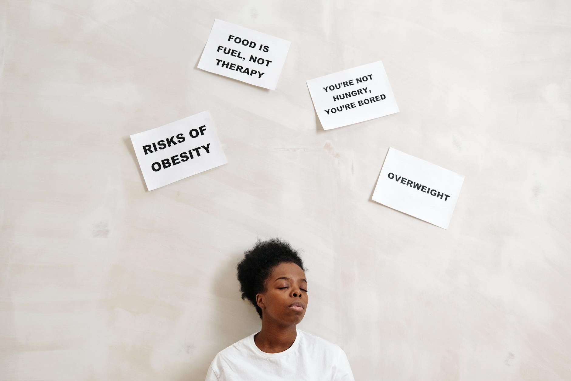 African American woman with health messages about nutrition and obesity awareness. - mental health habits