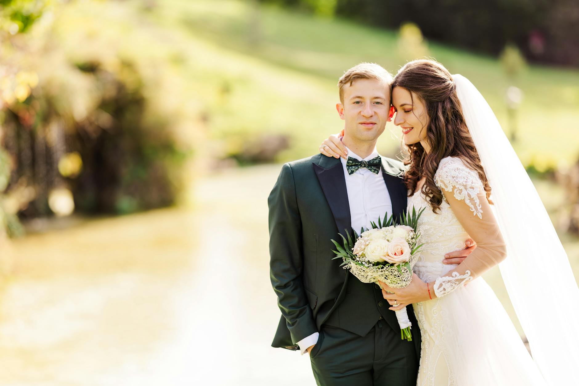 Elegant bride and groom in scenic Bușteni, Romania, enjoying their special day. - wedding stress relief