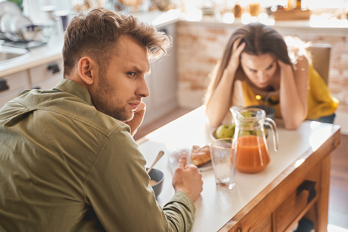 Couple contemplating marriage counseling