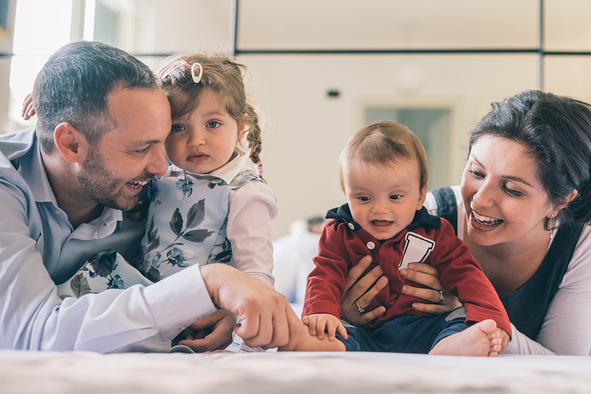 Happy family strengthening relationships with CBT in their daily life