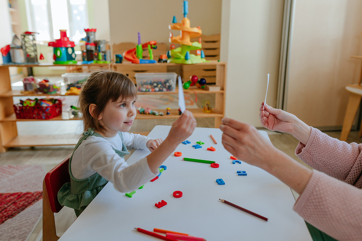 Therapist and child during ABA therapy session