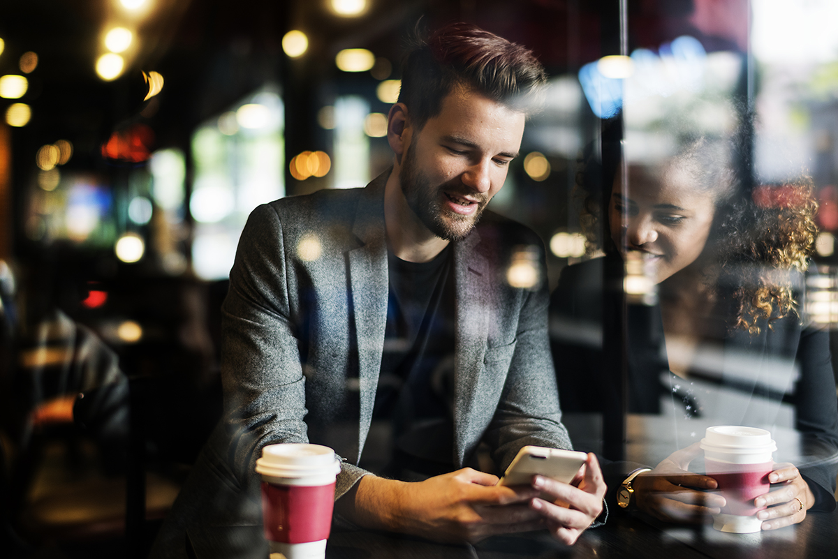 Couple at a coffee shop on their first date