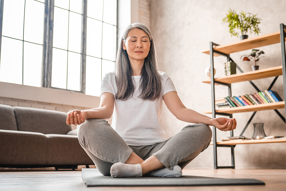 Person meditating as part of their self-love practice