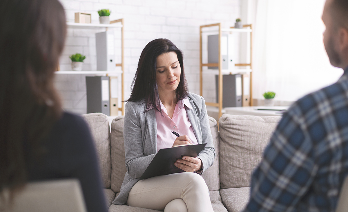 Couple consulting a professional therapist for relationship guidance