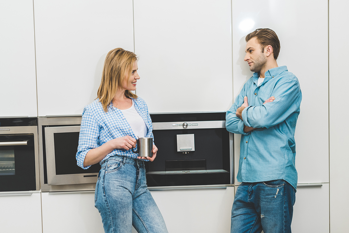 Two individuals deeply engaged in conversation, highlighting the importance of open communication in how to fix a falling apart relationship.