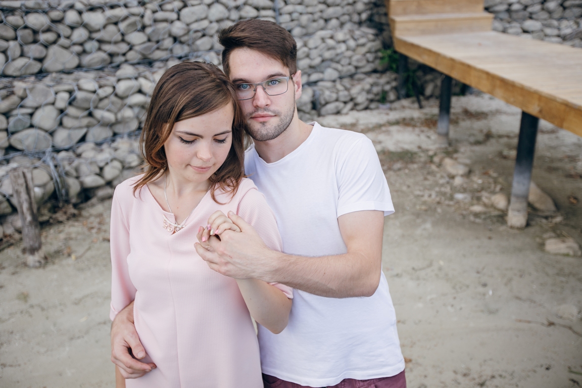 Couple holding hands and comforting each other