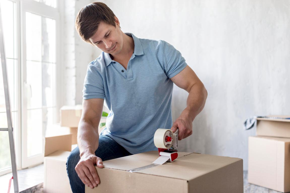 Person packing belongings