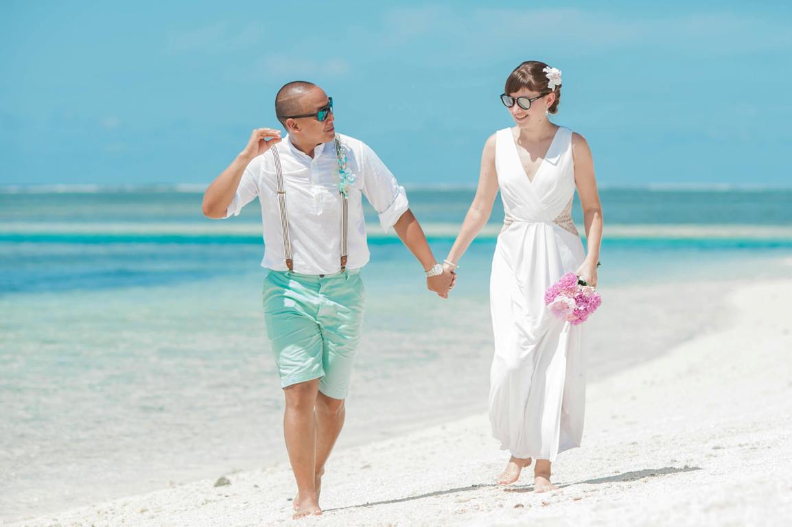 Couple Walking on Beach