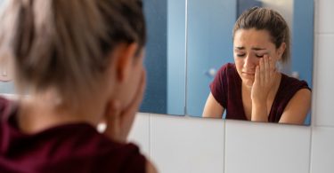 Woman feeling trapped in a relationship with a narcissist