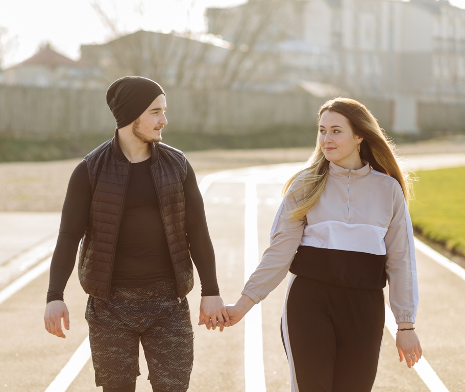 Couple holding hands