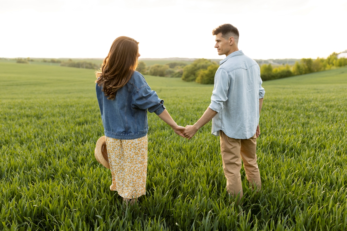 Couple holding hands