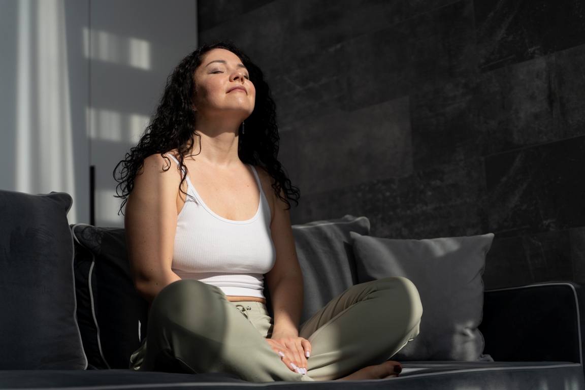 Woman practicing deep breathing to manage anger