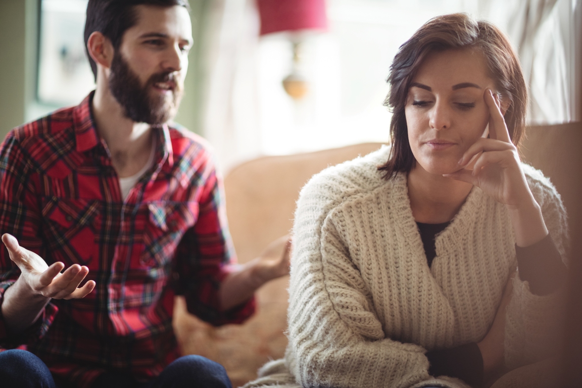 Couple navigating a difficult conversation with empathy