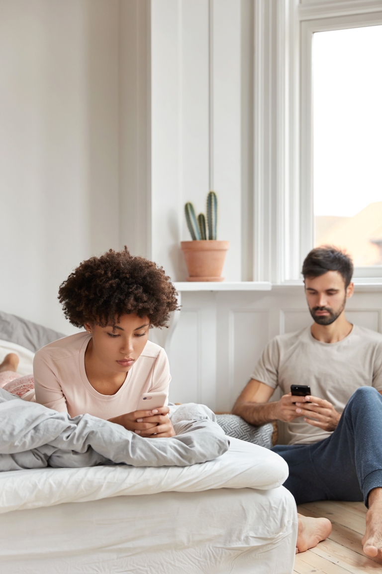 Couple experiencing communication breakdown in a long distance relationship